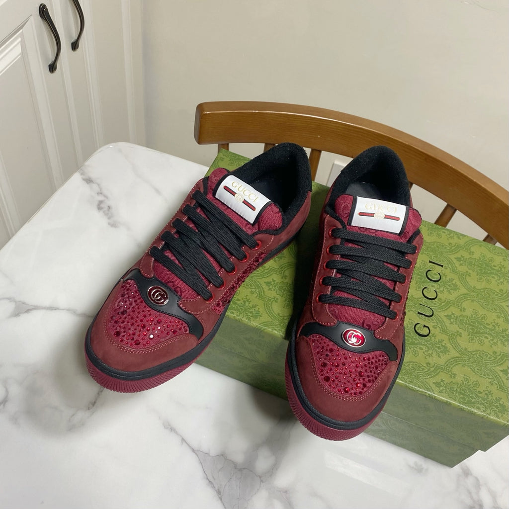Gucci unisex sneakers front view, burgundy leather with black laces and tongue label