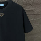Prada black short-sleeve T-shirt, crewneck and left shoulder close-up