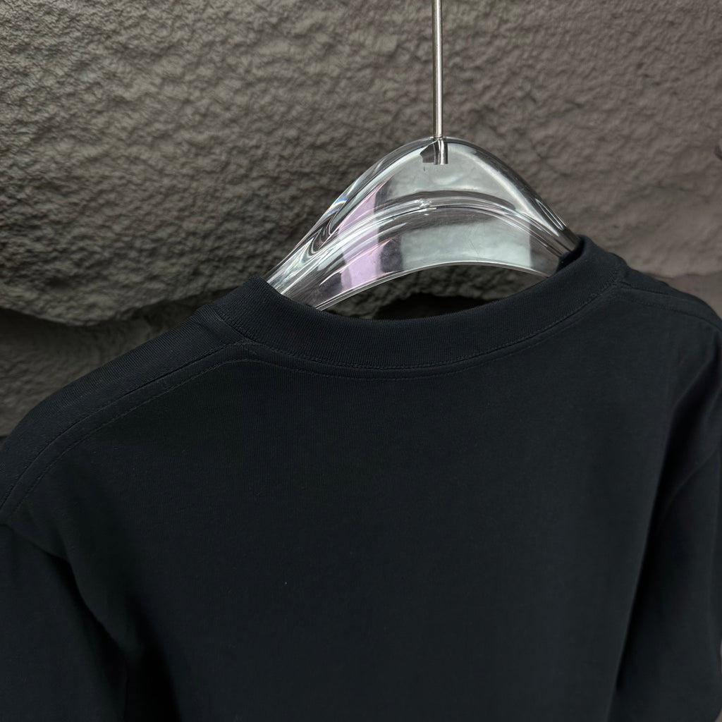 Prada black short-sleeve T-shirt neckline close-up on hanger