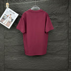Maroon short-sleeve T-shirt on a hanger, back view