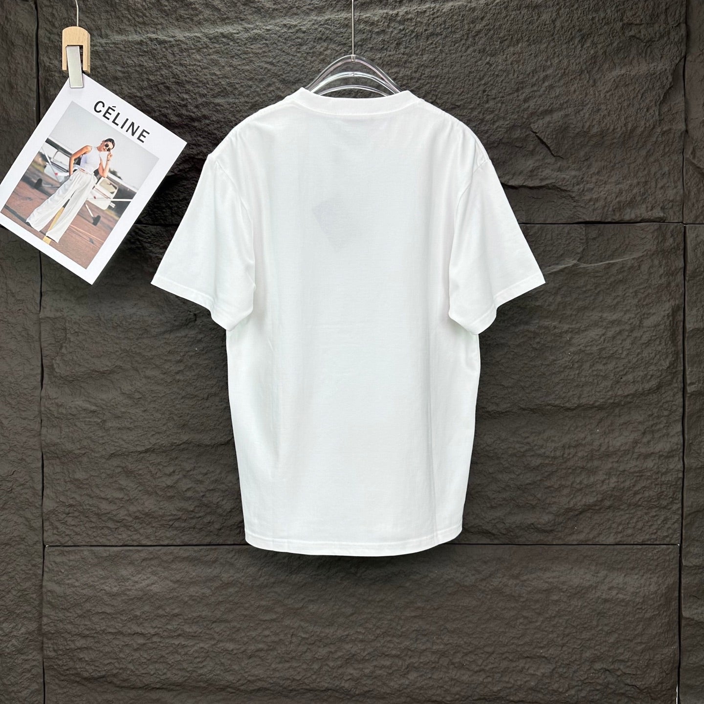 Prada short-sleeve T-shirt in white, back view on hanger