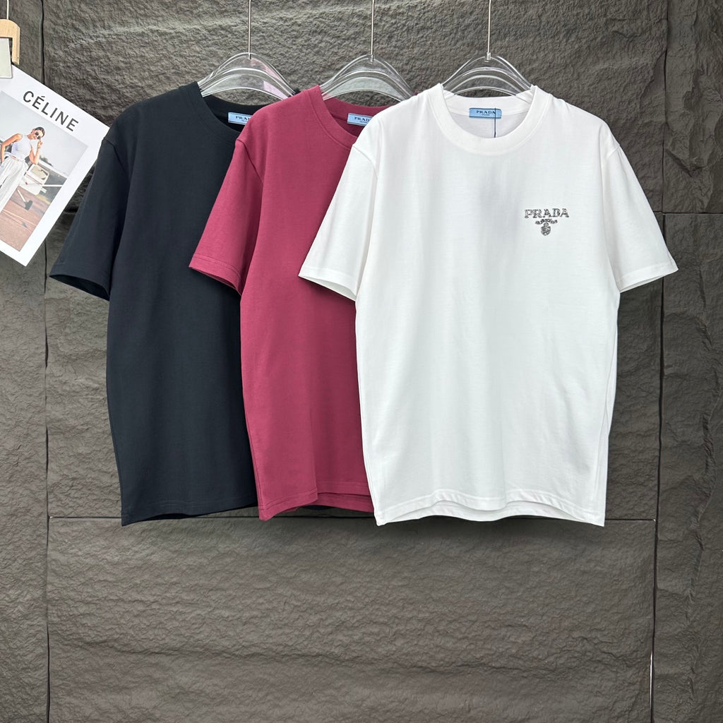 Prada short-sleeve T-shirts in black, burgundy, and white with chest logos
