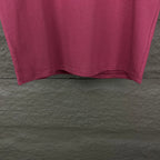 Prada short-sleeve T-shirt hem in dark berry, underside view.