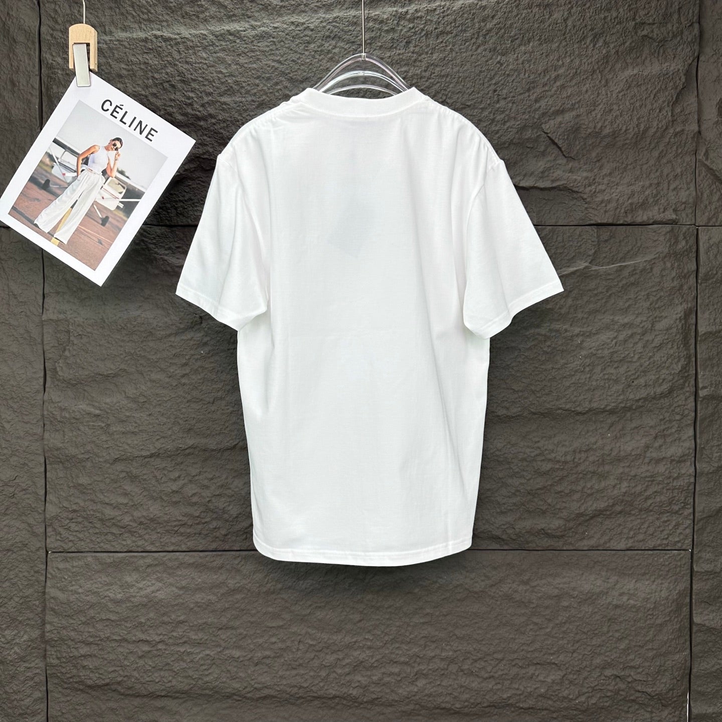 White short-sleeve T-shirt back view on hanger