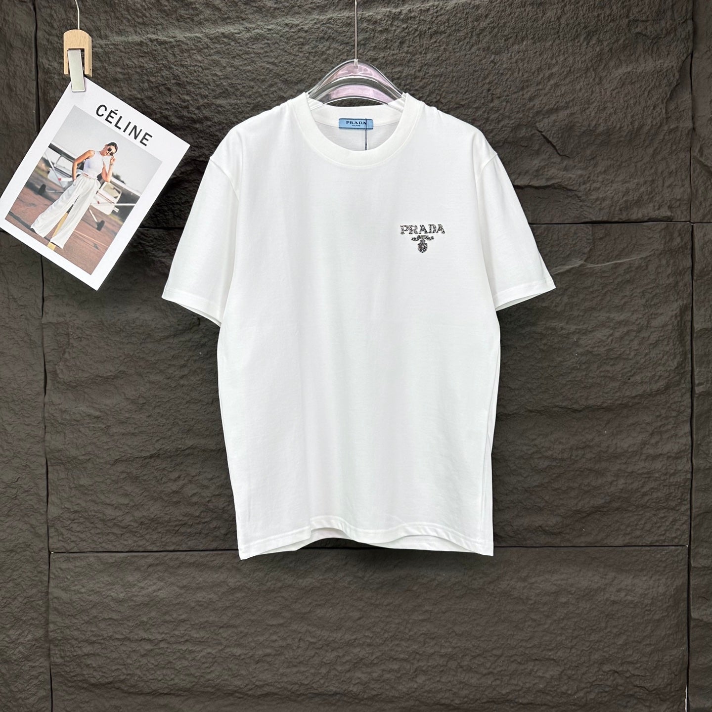 White short-sleeve T-shirt with small PRADA logo on left chest