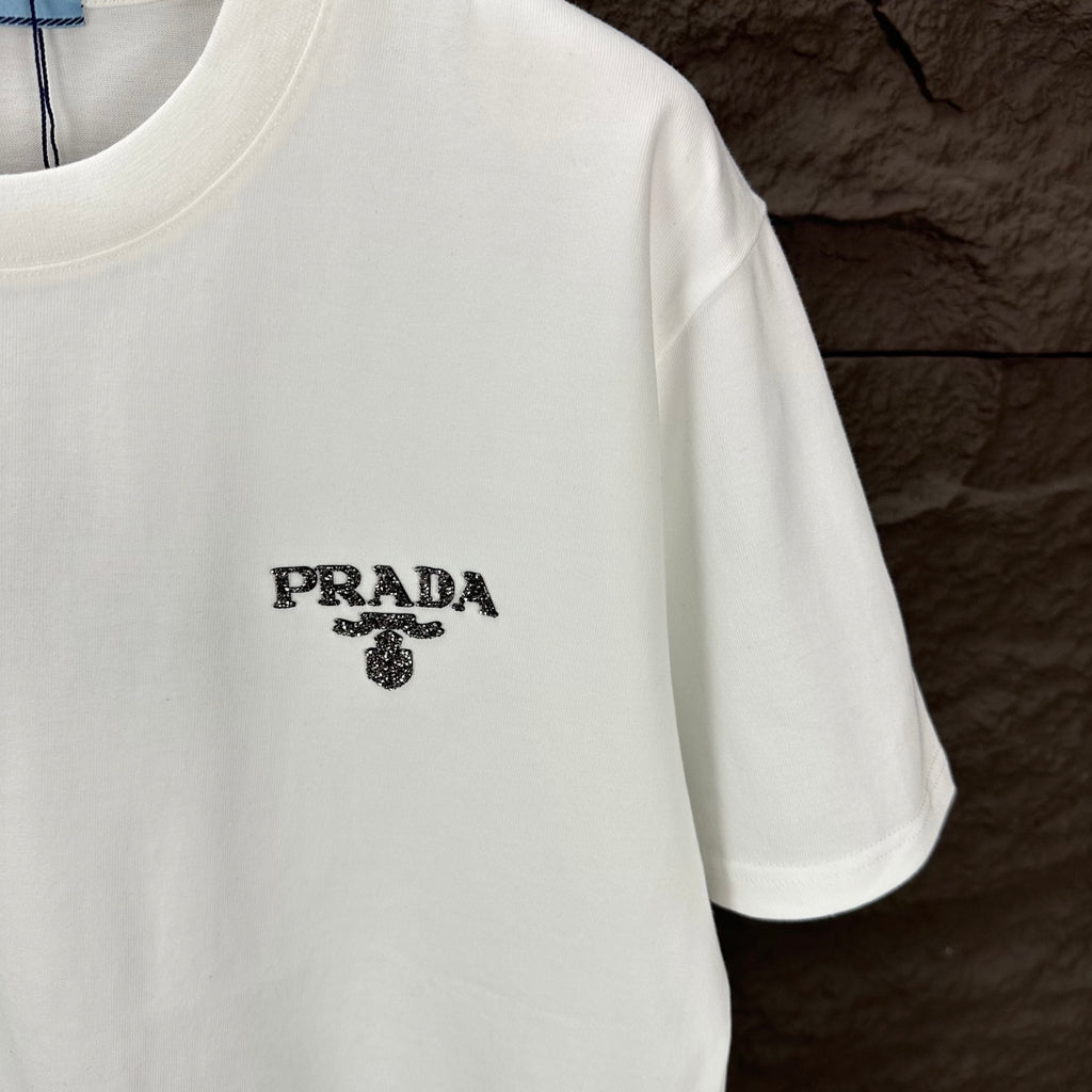 White short-sleeve T-shirt with PRADA logo graphic on chest