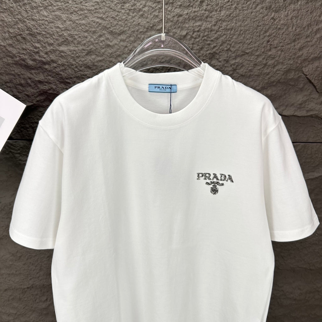 White short-sleeve T-shirt with PRADA logo on left chest, front view