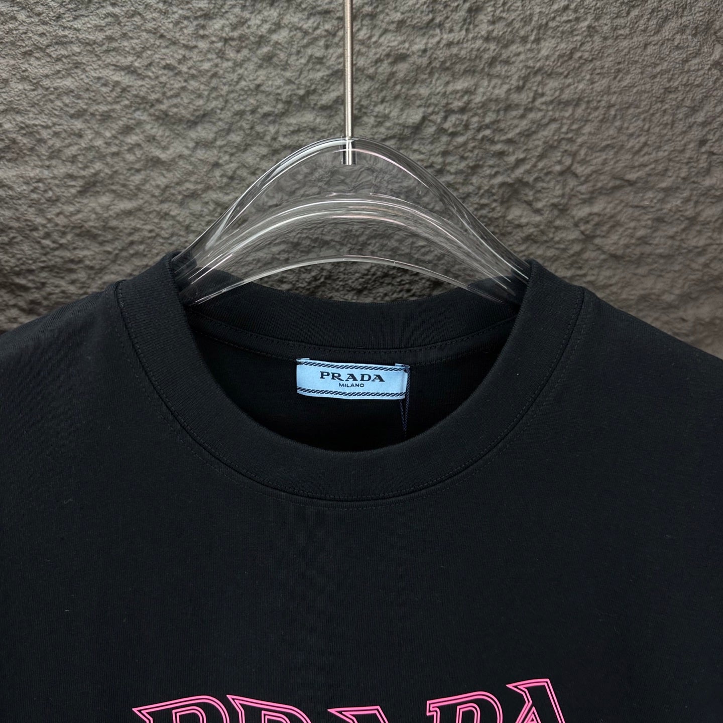 Prada short-sleeve T-shirt collar on black fabric, with PRADA label