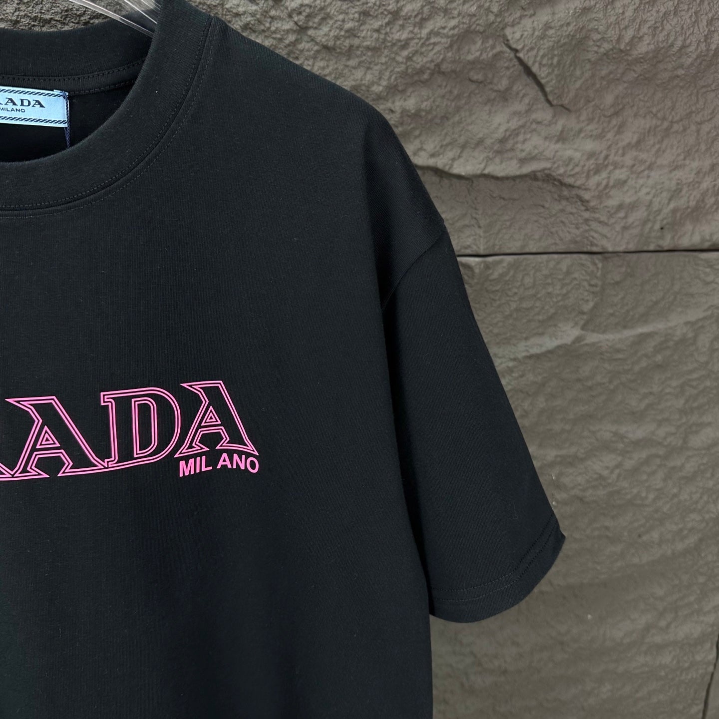 Prada short-sleeve T-shirt, black with pink PRADA MILANO lettering