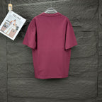 Burgundy crewneck Prada T-shirt, plain back view on hanger