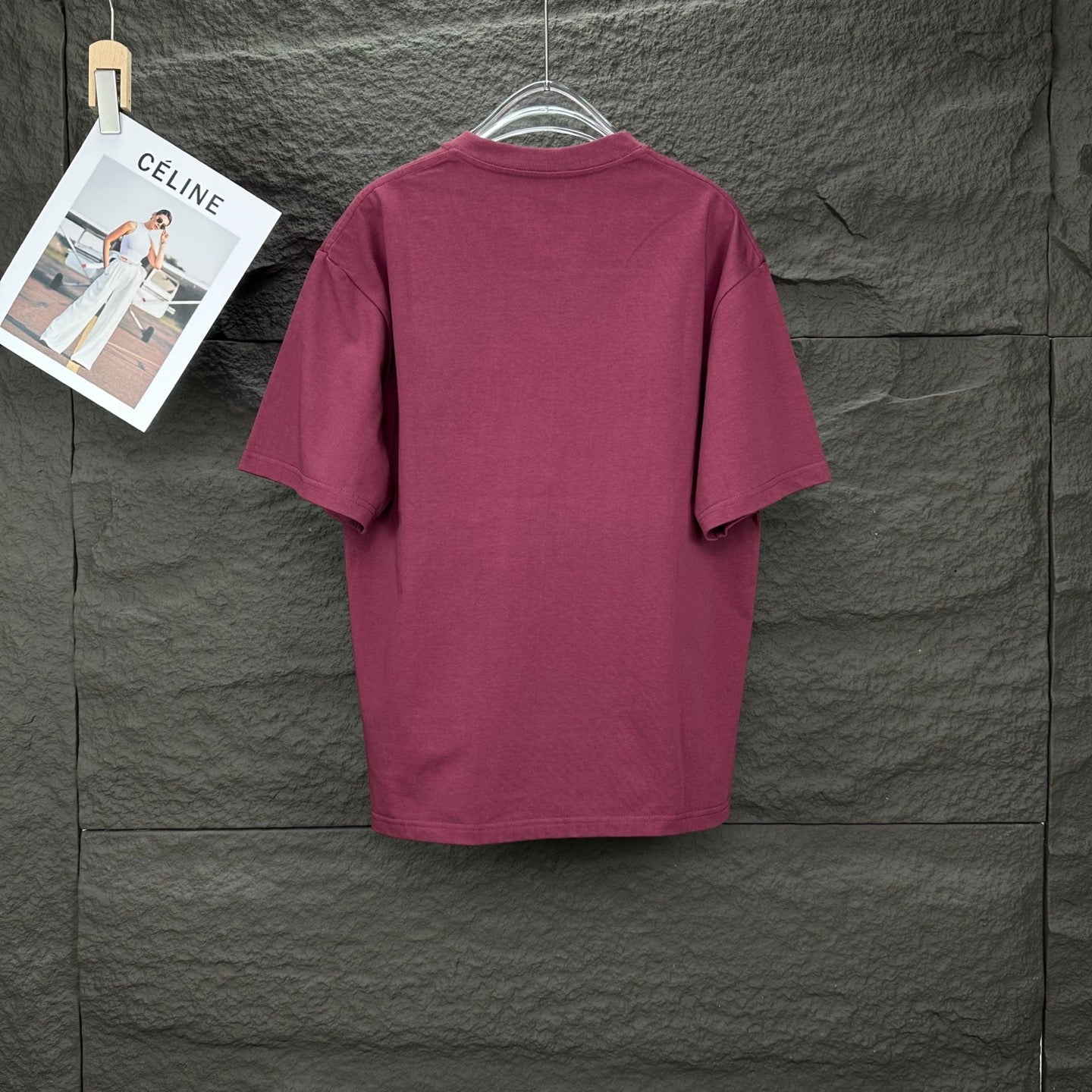 Burgundy crewneck Prada T-shirt, plain back view on hanger