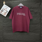 Burgundy crewneck Prada T-shirt with PRADA MIL ANO chest logo
