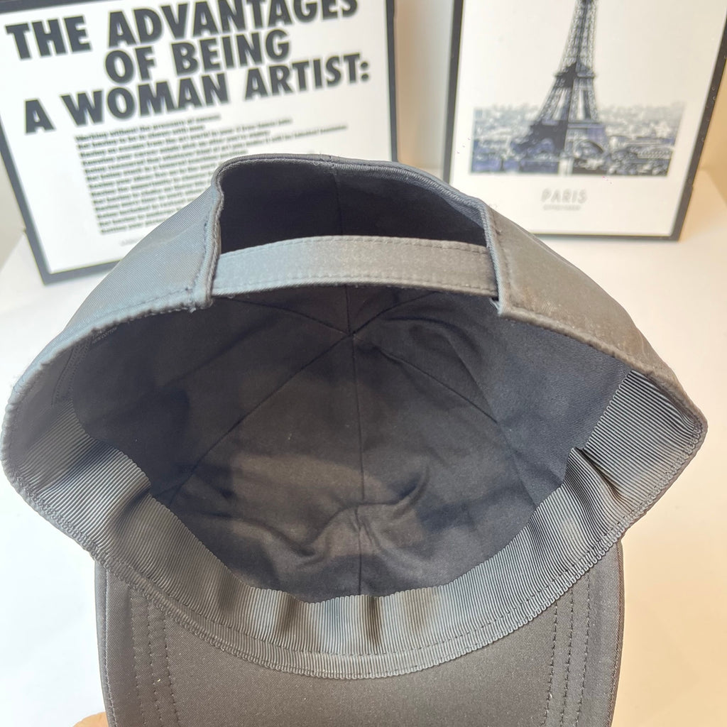 Prada baseball cap interior view with stitched seams and curved brim