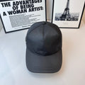 Prada baseball cap in dark charcoal with curved brim and stitched crown