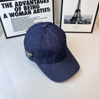 Prada denim cap in dark blue, angled view with front brim and side profile.