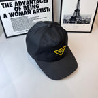 Prada baseball cap, dark gray, side profile with yellow Prada Milano logo
