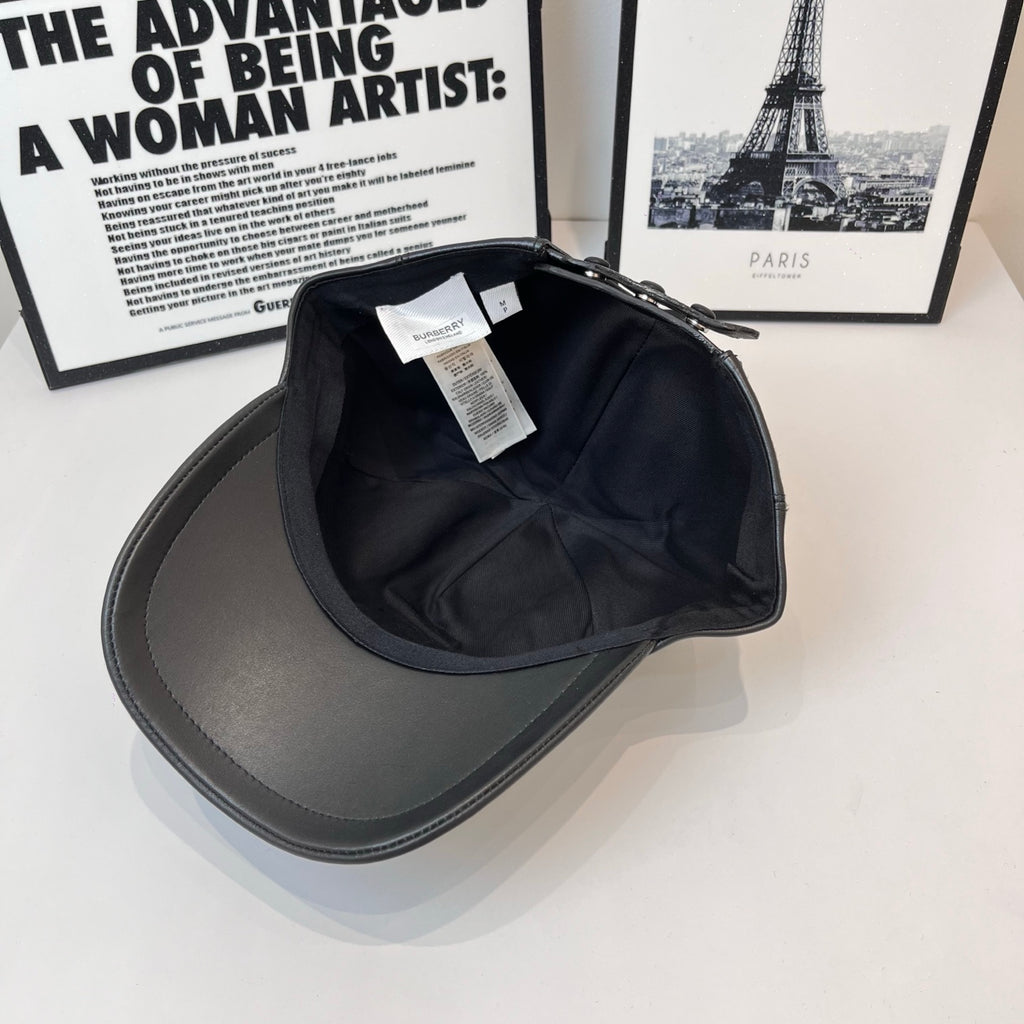 Leather baseball cap interior with black lining and hanging product tags