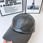 Dark leather baseball cap with embossed Burberry TB logo, curved brim