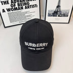 Black Burberry baseball cap with front logo and "LONDON ENGLAND" text.