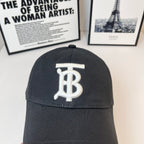 Black Burberry cap close-up front with large white TB logo