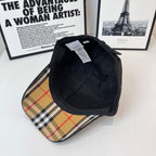 Dark Burberry cap interior view with stitched seams and inner lining