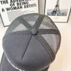 Black Burberry mesh cap top view with stitched crown panel and button