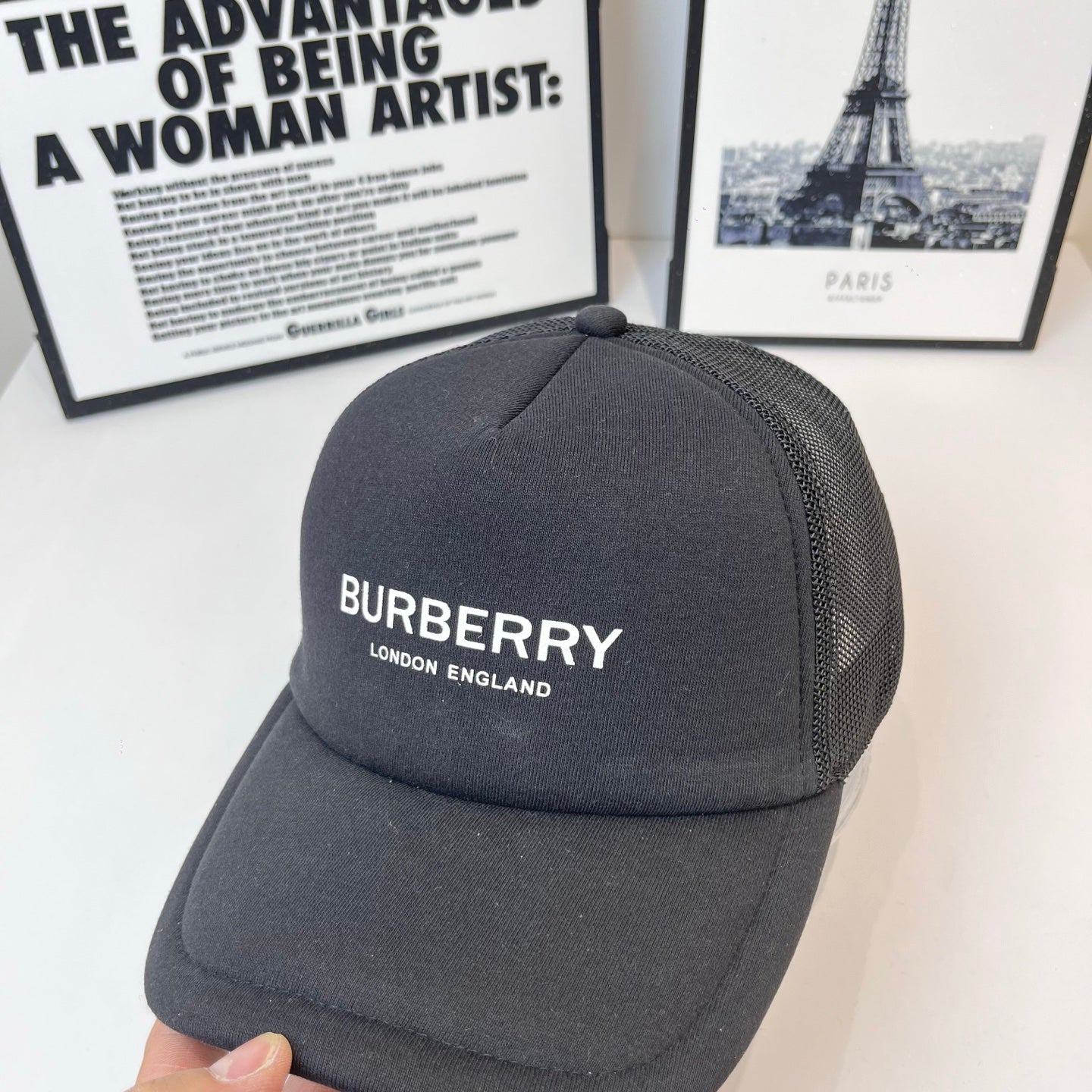Black Burberry baseball cap with raised crown and front logo