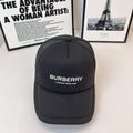 Black Burberry baseball cap with front logo patch and curved brim