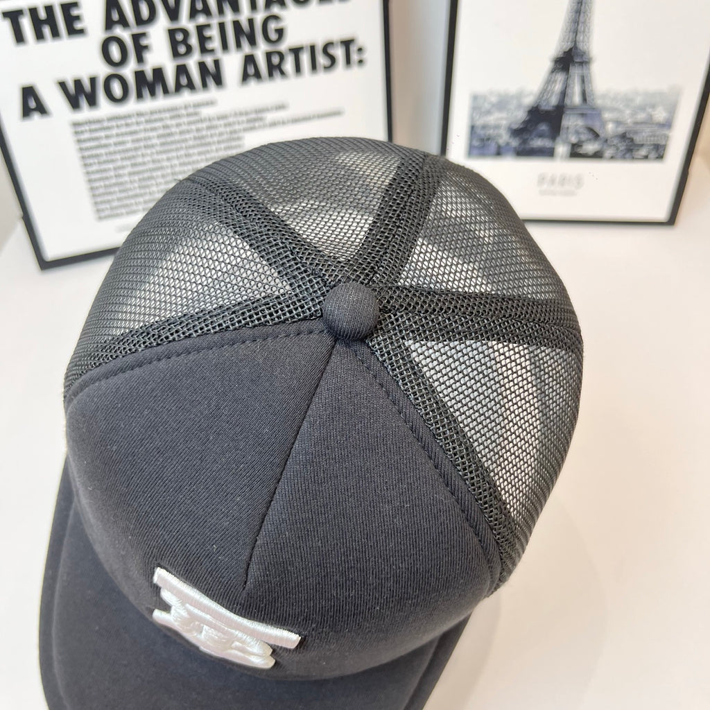 Black mesh-back cap with stitched crown panels and small white logo detail