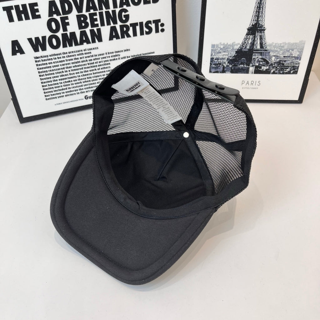 Black baseball cap with mesh side panels and adjustable strap detail near crown