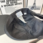 Burberry cap interior with fabric lining, seam details, and white care tag