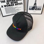 Black mesh baseball cap with front Burberry logo and curved brim