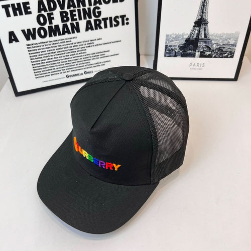 Black mesh baseball cap with front Burberry logo and curved brim
