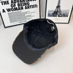 Black cap interior with stitched lining and inner brim edge