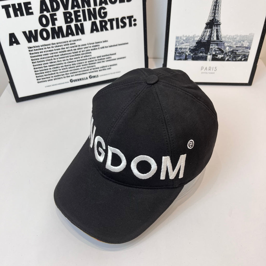 Black cap with 'KINGDOM' embroidery and small circular logo on side