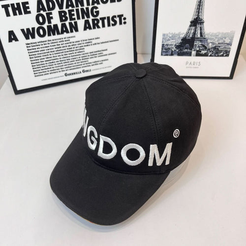 Black cap with 'KINGDOM' embroidery and small circular logo on side
