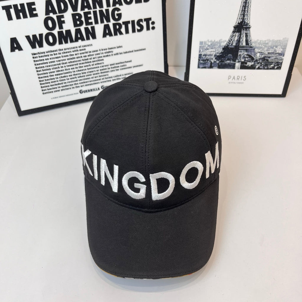 Black cap with 'KINGDOM' embroidered lettering across front