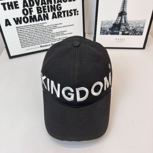 Black cap with 'KINGDOM' embroidered lettering across front