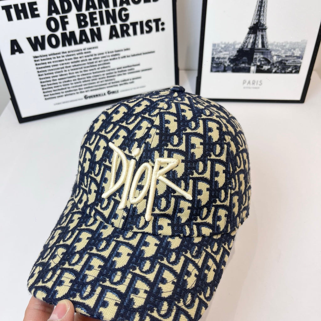 Dior cap with navy-and-cream logo fabric and large Dior monogram on front.