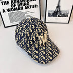 Dior cap with navy-and-cream logo pattern and curved brim, side profile.