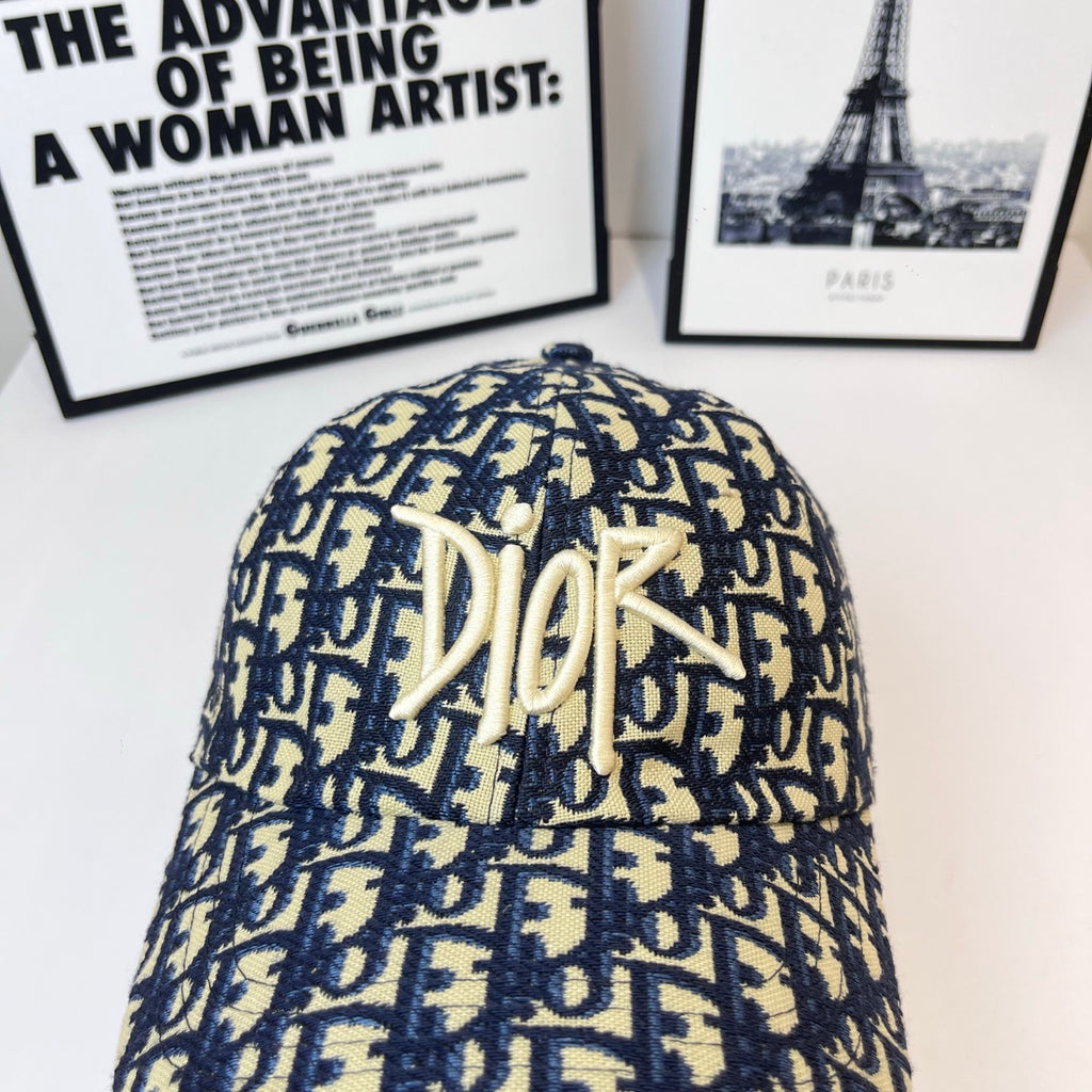 Dior cap with navy-and-cream logo crown, no brim shown, top view.