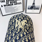 Dior cap with navy-and-cream logo crown, no brim shown, top view.