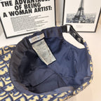Dior cap interior lining with label and adjustable strap, open crown view.