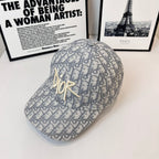 Dior monogram cap, side view with gold Dior logo and patterned fabric