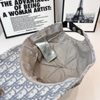Dior monogram cap inside view with beige lining and size tag