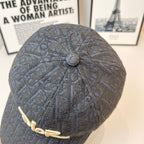 Dior monogram cap in dark navy with ridged back and small center button