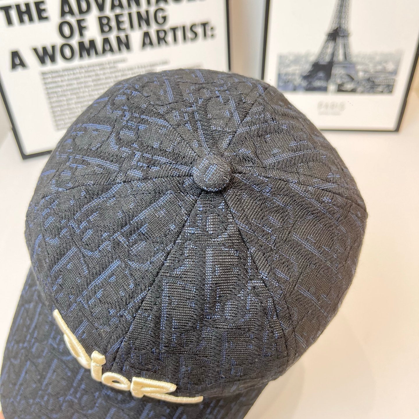 Dior monogram cap in dark navy with ridged back and small center button