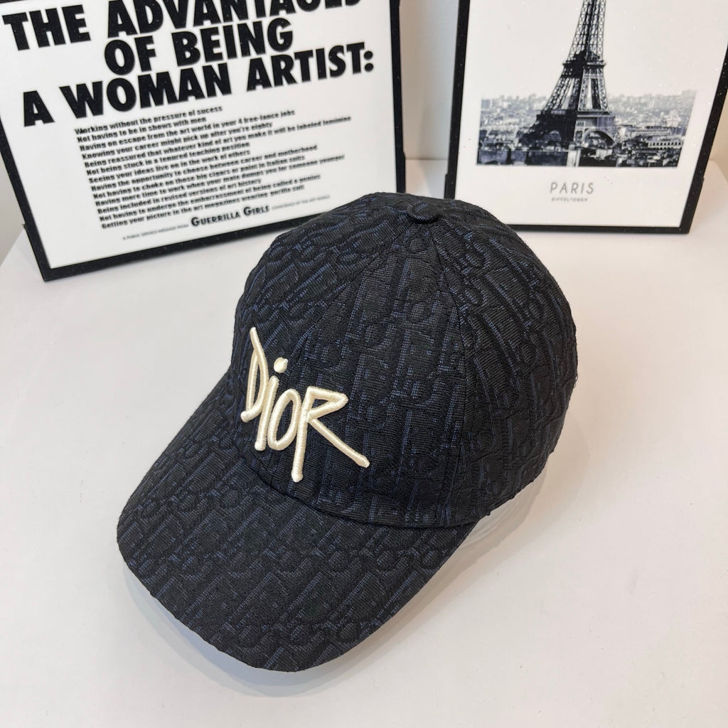 Dior monogram cap in dark navy with gold-tone Dior logo, angled front view