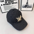 Dior monogram cap in dark navy with gold-tone Dior logo, side front