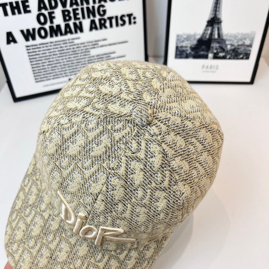 Dior cap in beige monogram fabric with raised Dior logo embroidery, rear view.